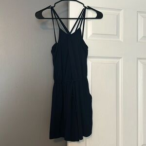 Cute little blue romper never worn with pockets